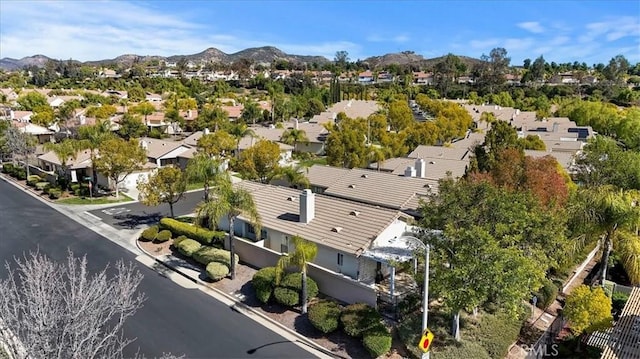 birds eye view of property with a residential view and a mountain view