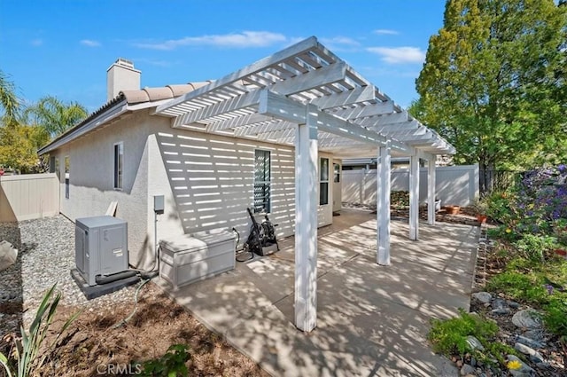 view of patio / terrace with a fenced backyard and a pergola