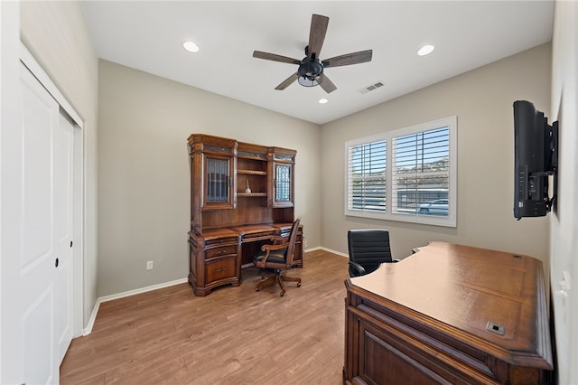 office area with baseboards, visible vents, a ceiling fan, light wood-style floors, and recessed lighting