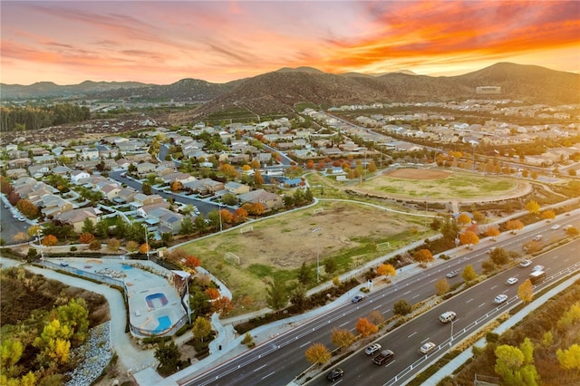 bird's eye view with a residential view and a mountain view