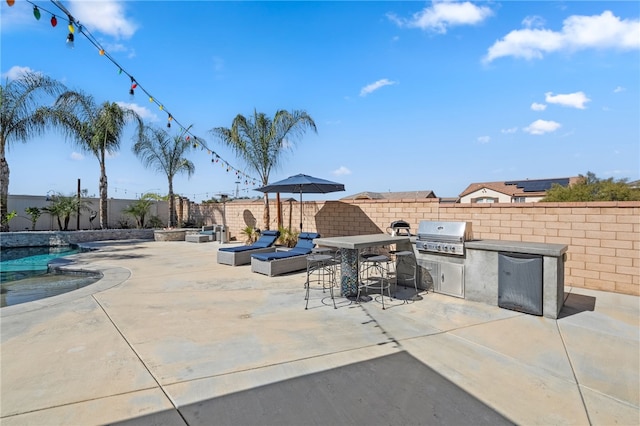 view of patio featuring a fenced backyard and area for grilling