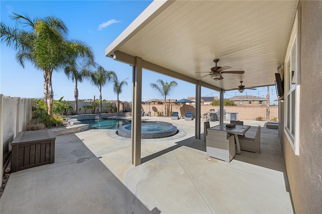 view of patio / terrace with a fenced backyard, a fenced in pool, and a ceiling fan