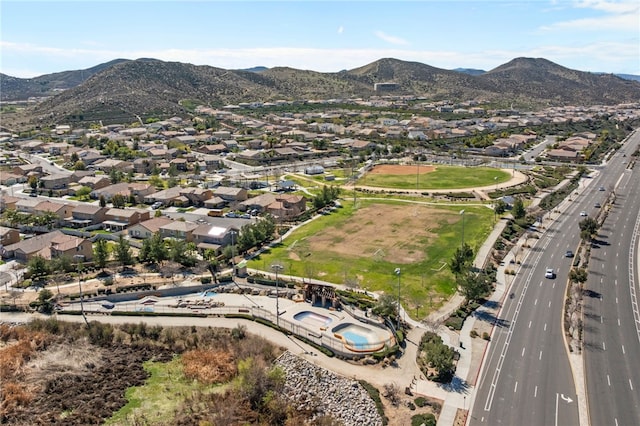 drone / aerial view with a residential view and a mountain view