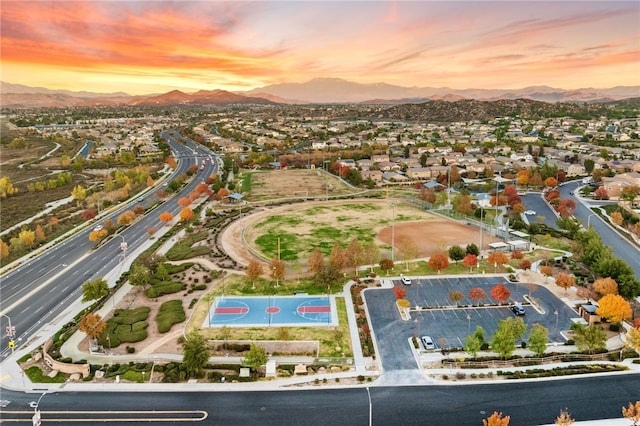 aerial view at dusk with a residential view and a mountain view