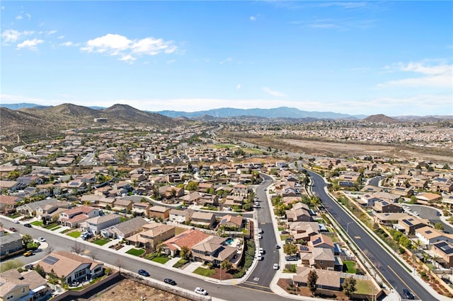 birds eye view of property with a residential view and a mountain view