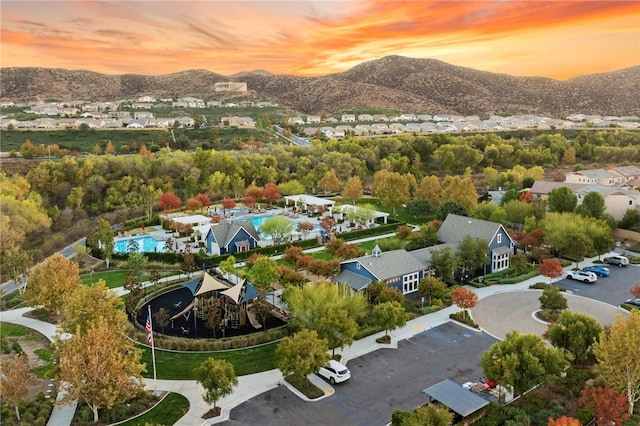 aerial view at dusk with a residential view and a mountain view