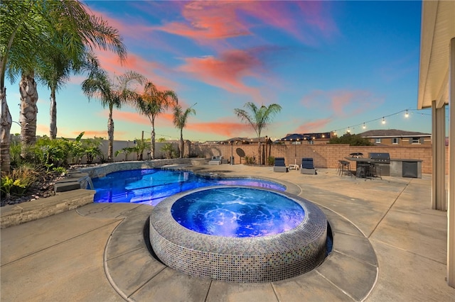 pool at dusk with a patio area, a fenced backyard, area for grilling, and an in ground hot tub