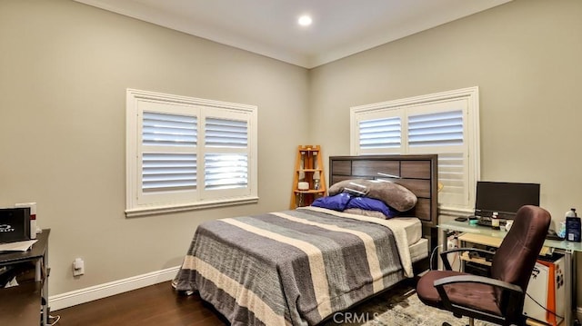 bedroom featuring dark wood-type flooring