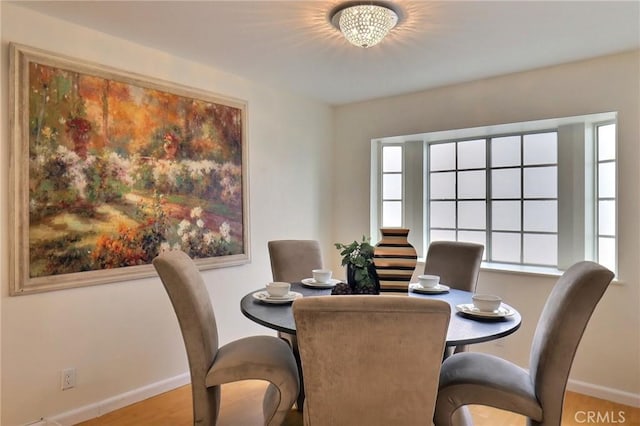 32 Diamond St Unit D, Arcadia, CA 91006 - dining space featuring baseboards and wood finished floors