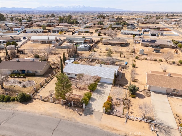 drone / aerial view with a mountain view and a residential view