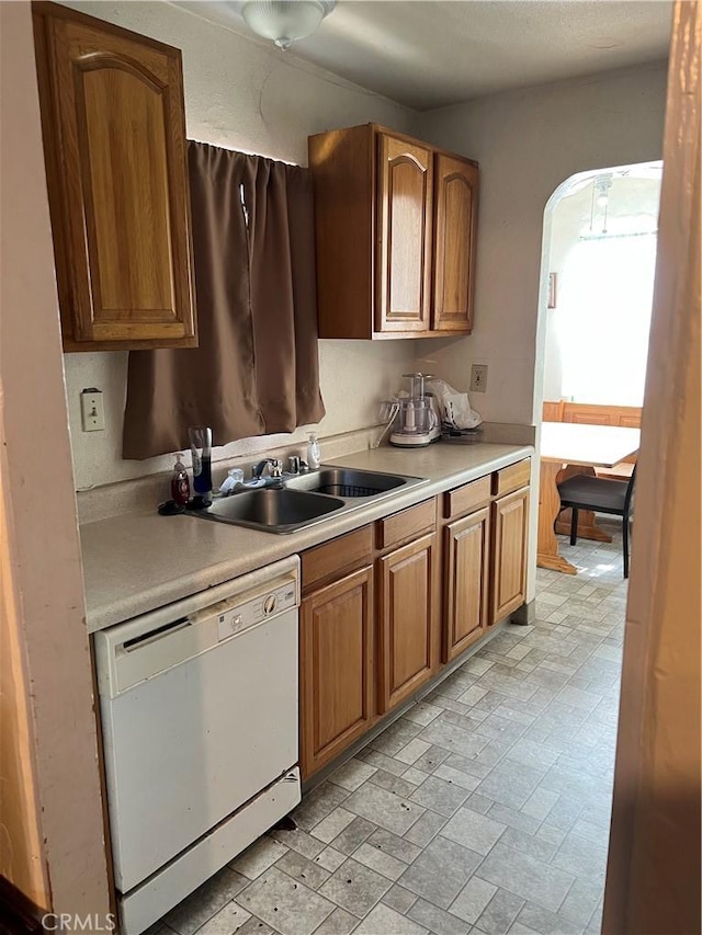 kitchen featuring dishwasher and sink