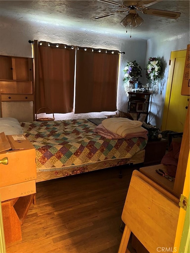 bedroom with hardwood / wood-style floors