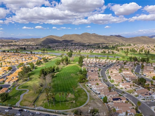 birds eye view of property with a residential view and a water and mountain view