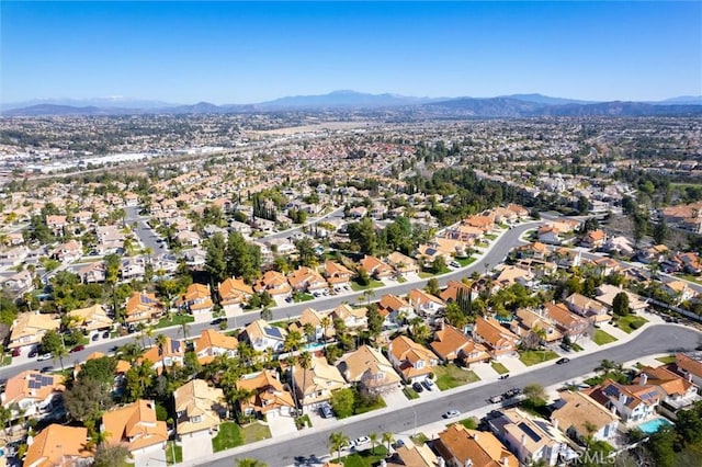 birds eye view of property with a residential view and a mountain view