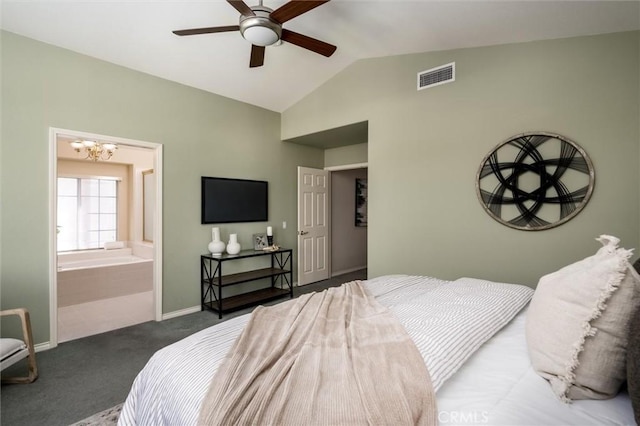 bedroom featuring baseboards, visible vents, lofted ceiling, ensuite bathroom, and dark colored carpet