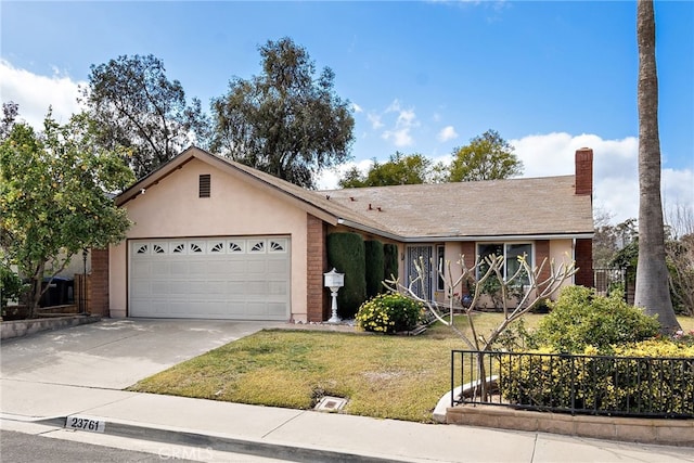 ranch-style house with a garage and a front yard