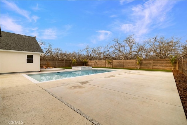 view of swimming pool with a patio area, a fenced backyard, and a fenced in pool