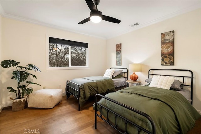 9243 Turner Ln, Durham, CA 95938 - bedroom featuring wood finished floors, ornamental molding, and ceiling fan