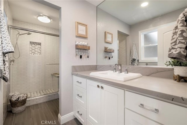 9243 Turner Ln, Durham, CA 95938 - bathroom featuring vanity, tiled shower, and recessed lighting