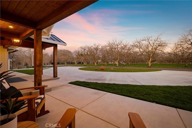 9243 Turner Ln, Durham, CA 95938 - patio terrace at dusk with a yard