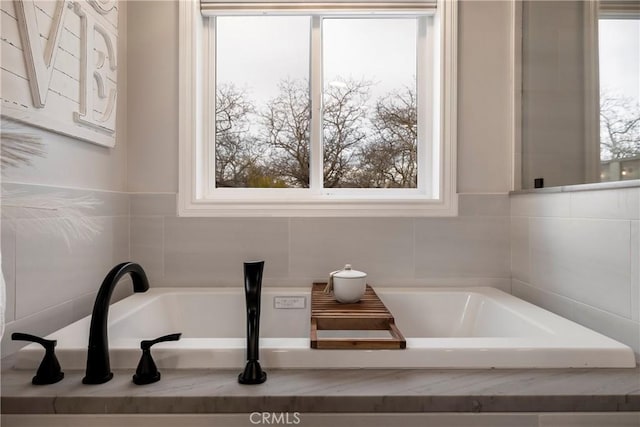 9243 Turner Ln, Durham, CA 95938 - bathroom featuring a garden tub and healthy amount of natural light