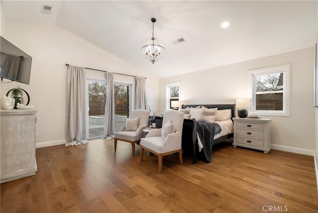 bedroom with access to exterior, lofted ceiling, visible vents, and light wood-style flooring