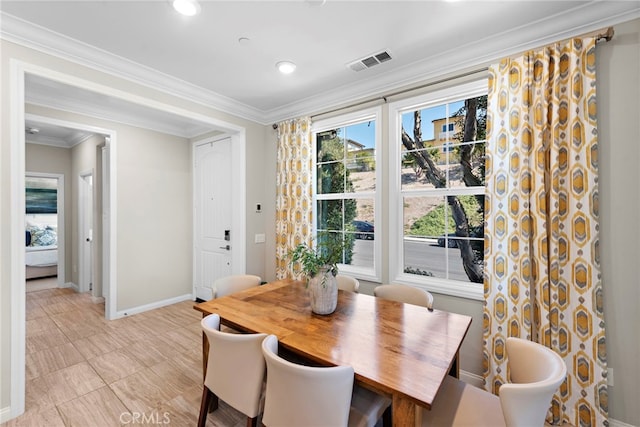 dining space with ornamental molding, recessed lighting, visible vents, and baseboards