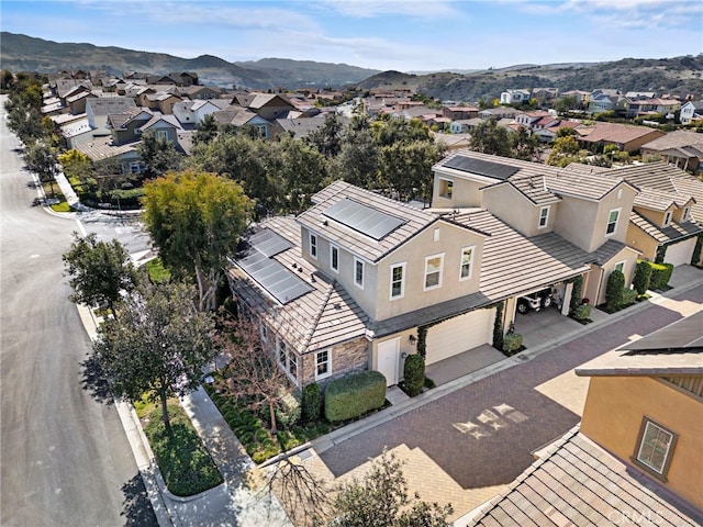 aerial view with a mountain view and a residential view