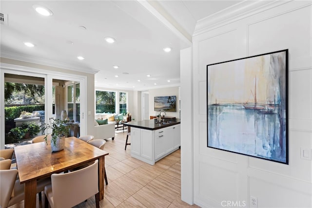 dining space with ornamental molding, visible vents, and recessed lighting