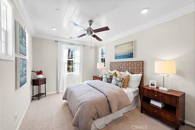 bedroom with crown molding, baseboards, light colored carpet, visible vents, and ceiling fan