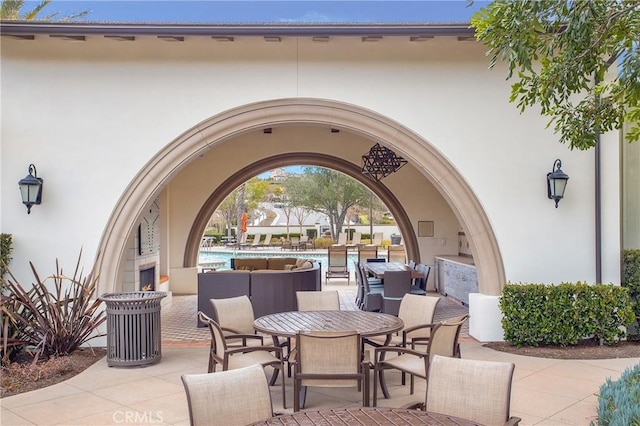 view of patio featuring a community pool