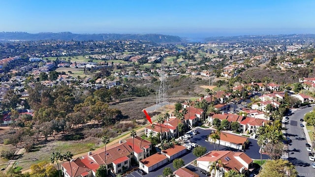 birds eye view of property featuring a mountain view