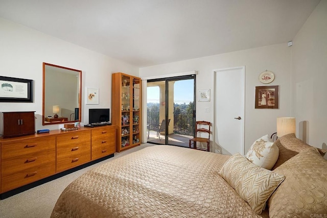 carpeted bedroom featuring access to exterior