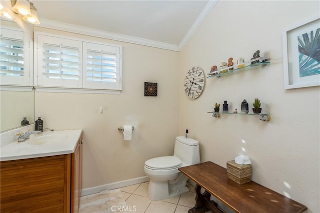 bathroom featuring toilet, crown molding, tile patterned flooring, and vanity