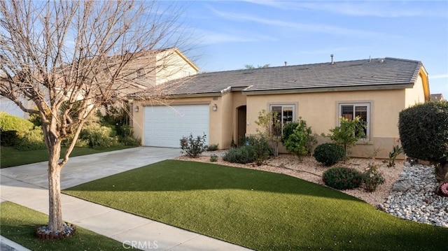 view of front of home featuring a garage and a front yard