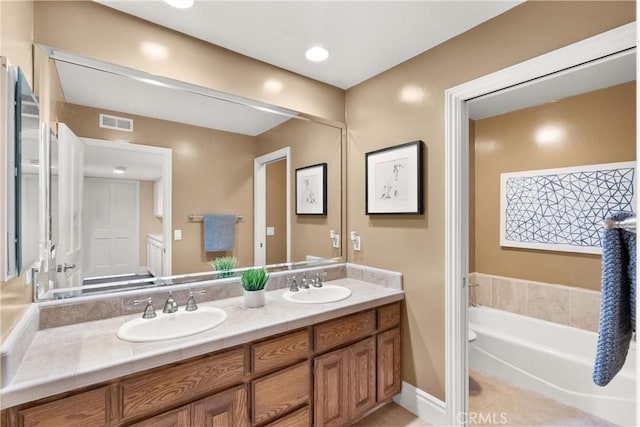 full bathroom with tile patterned flooring, a sink, double vanity, and visible vents