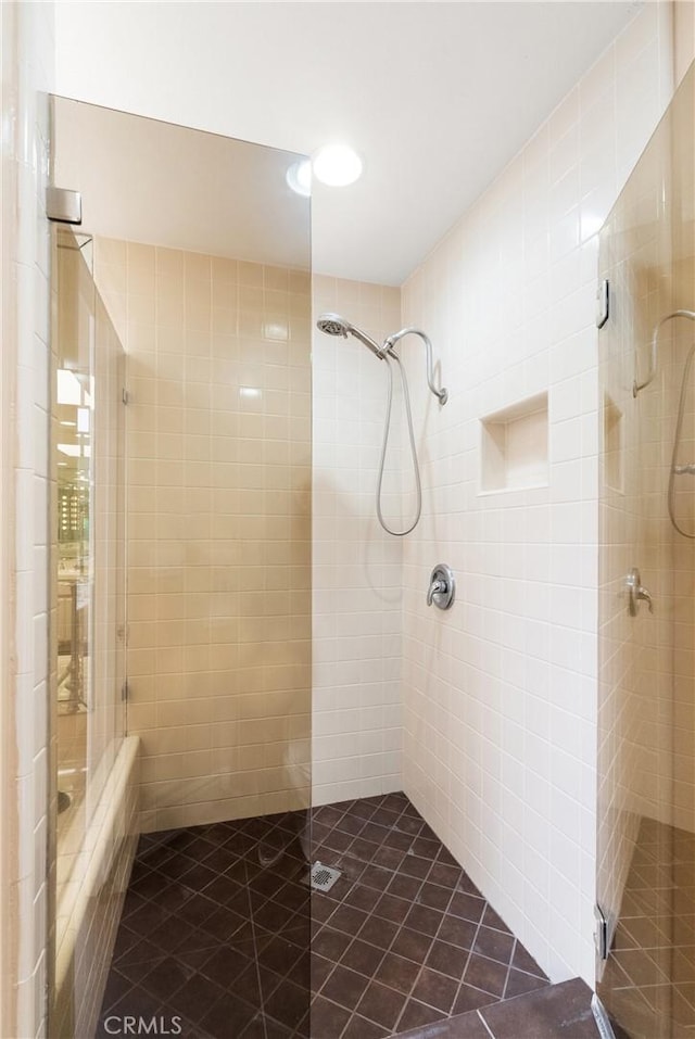 bathroom featuring a shower stall