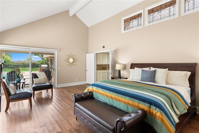bedroom with visible vents, baseboards, beam ceiling, high vaulted ceiling, and access to outside