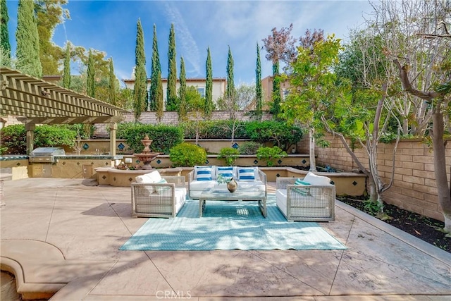 view of patio with grilling area, a pergola, and outdoor lounge area