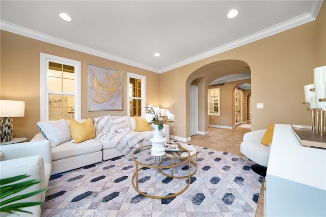 tiled living room featuring ornamental molding