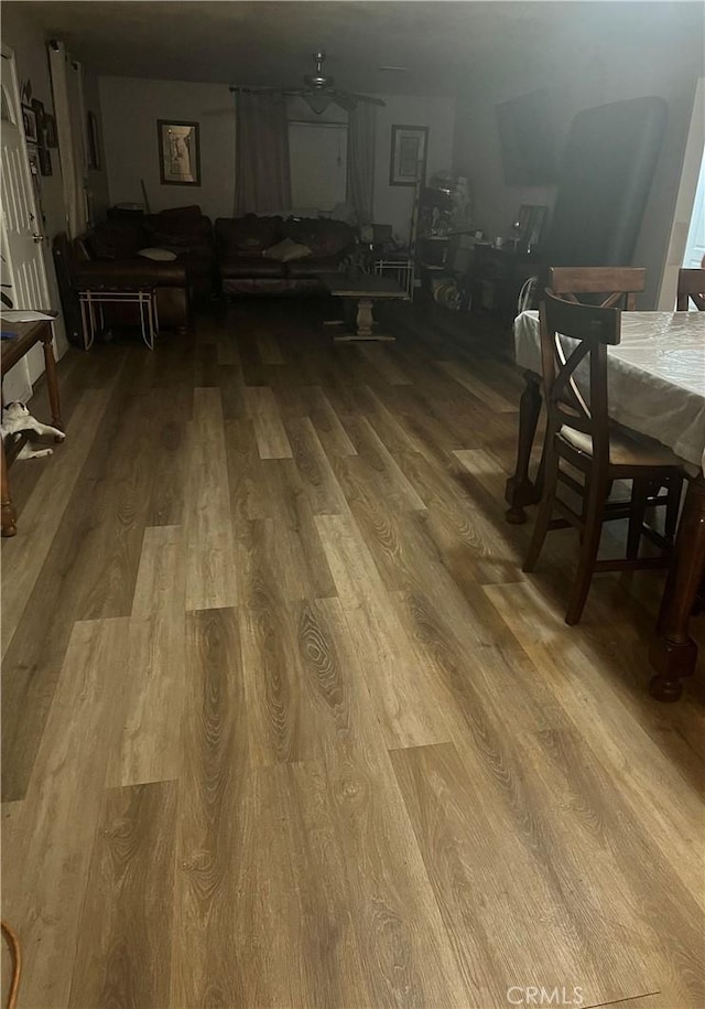 dining space featuring wood finished floors
