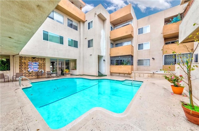 view of pool with a patio area