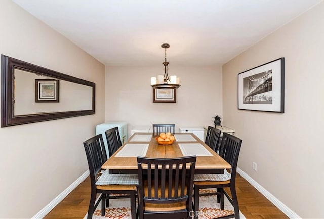 dining space featuring dark hardwood / wood-style flooring