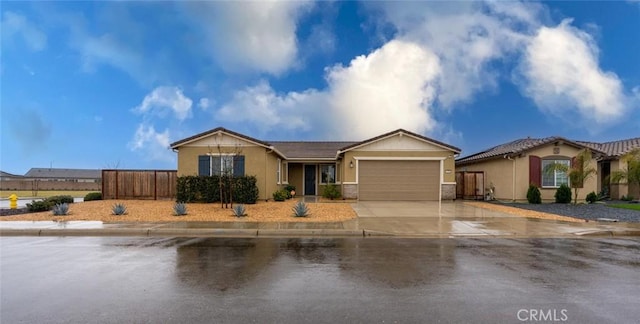 single story home featuring a garage