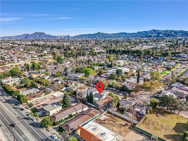 bird's eye view featuring a residential view and a mountain view