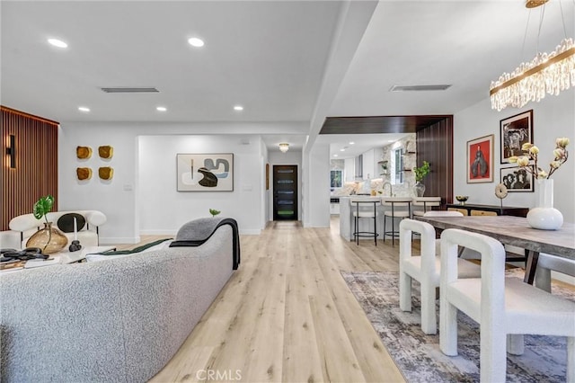 dining space featuring recessed lighting, baseboards, visible vents, and light wood finished floors