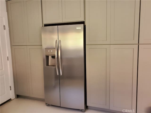 kitchen with stainless steel fridge with ice dispenser