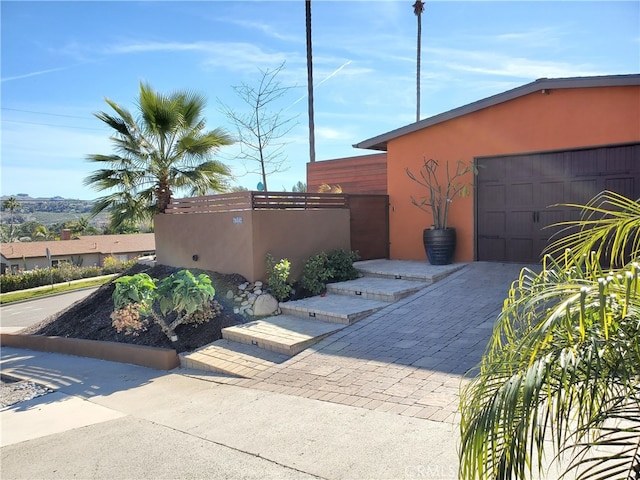 garage with driveway