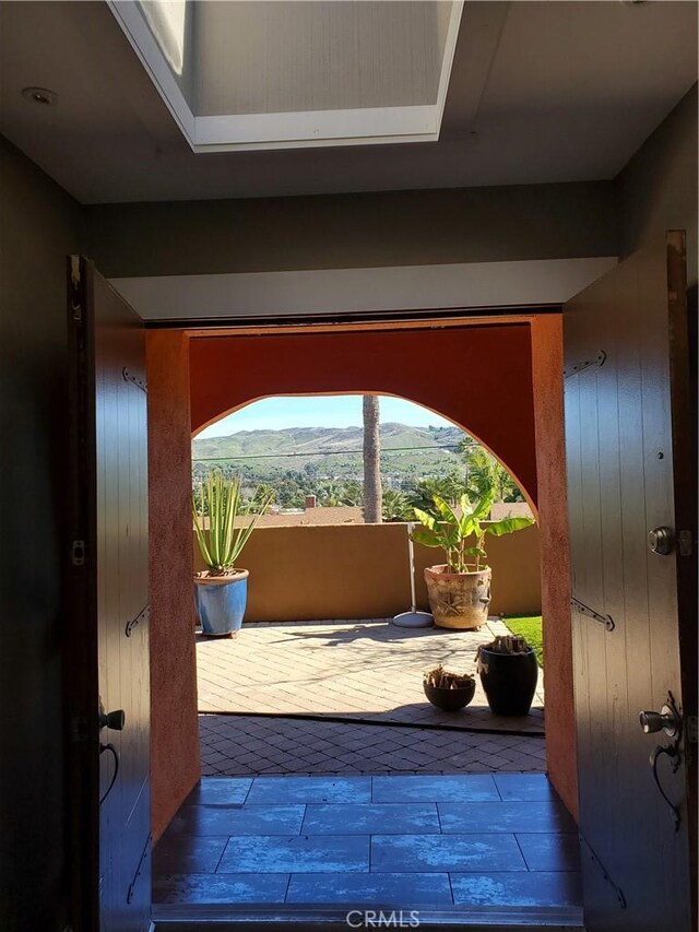 doorway to outside with wood finished floors