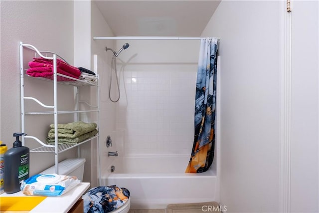 bathroom featuring toilet and shower / bathtub combination with curtain